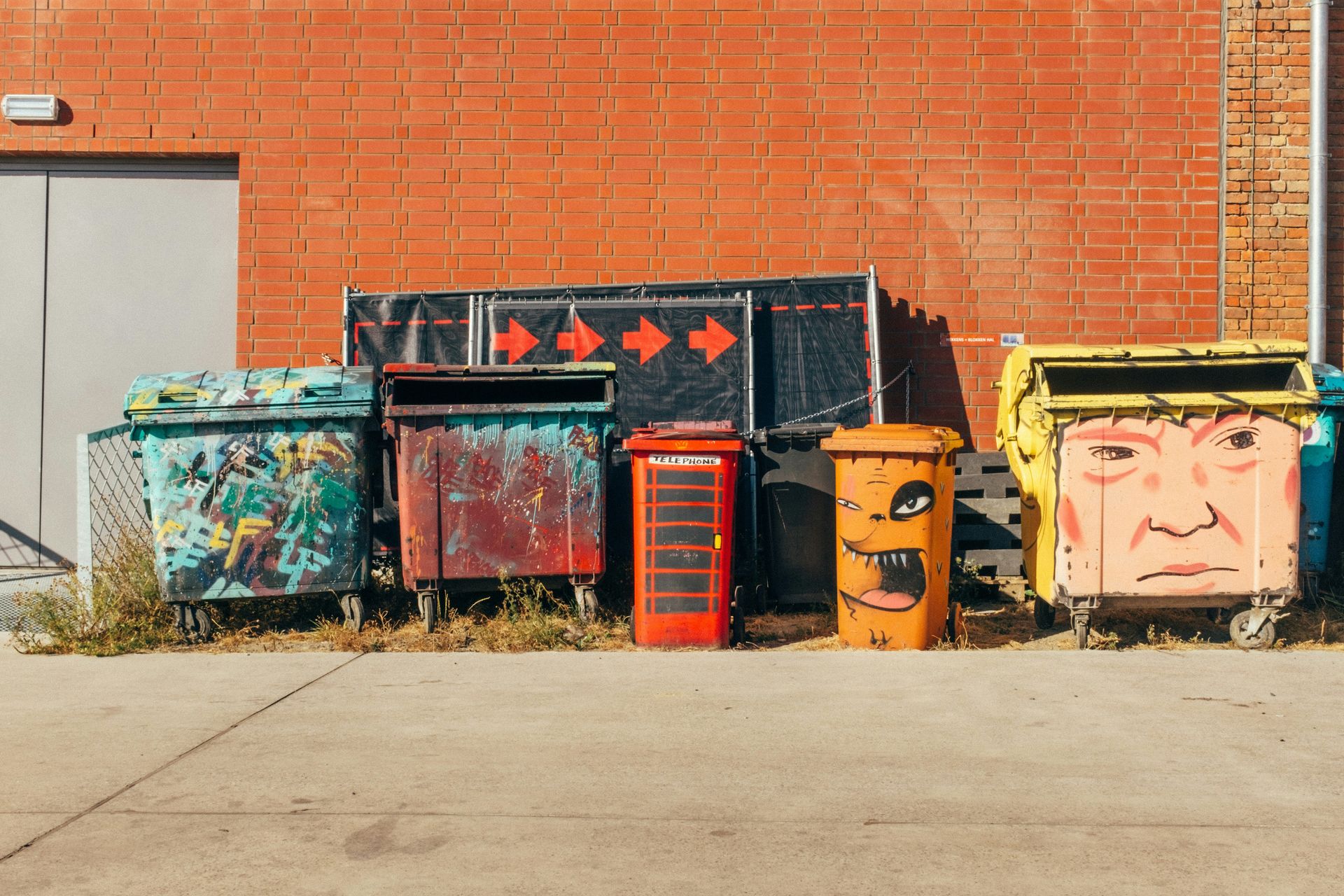 assorted-color trash bins